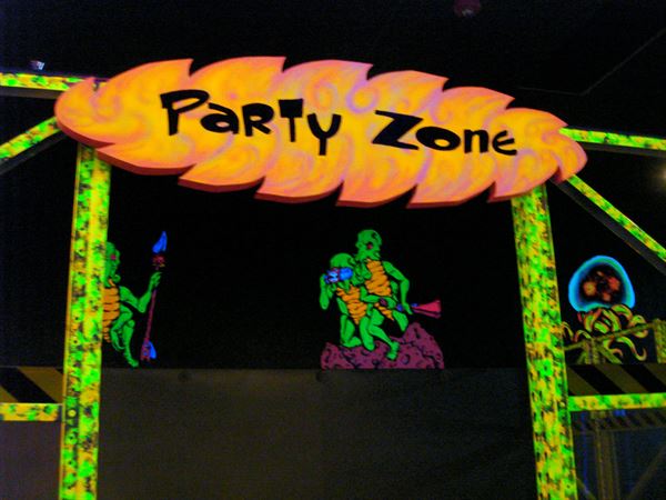 Glowing Greens Blacklight Miniature Golf: Alien Inavasion