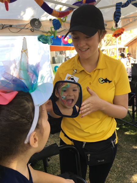 Smiley Orca Face Painting and Natural Henna