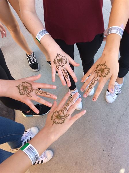 Smiley Orca Face Painting and Natural Henna