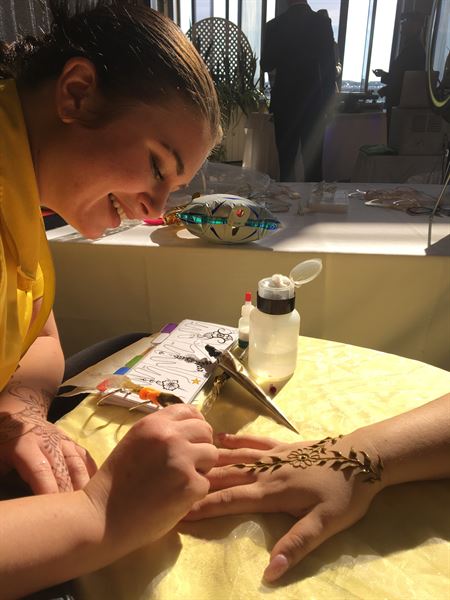 Smiley Orca Face Painting and Natural Henna