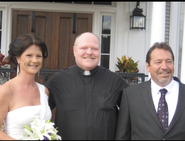 Rev. Fr. Shane E Simar Dr. HC