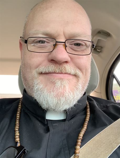 Rev. Fr. Shane E Simar Dr. HC