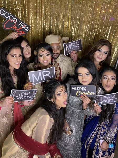 The Phototique Photo Booth and Flower Wall Rental