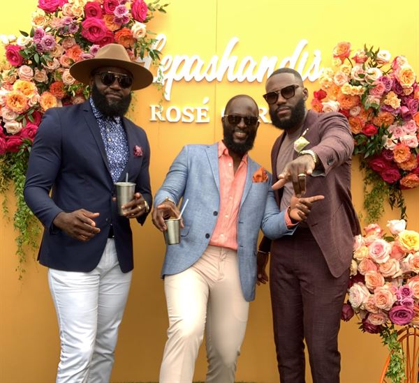 The Phototique Photo Booth and Flower Wall Rental