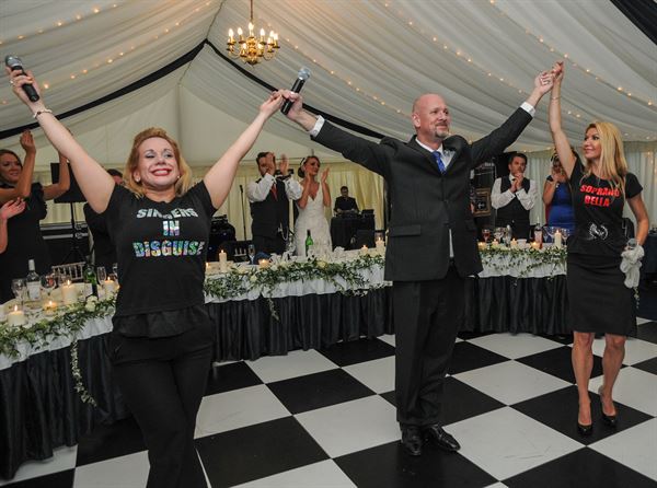 Singers in Disgusie by Katrina Murphy Entertainment