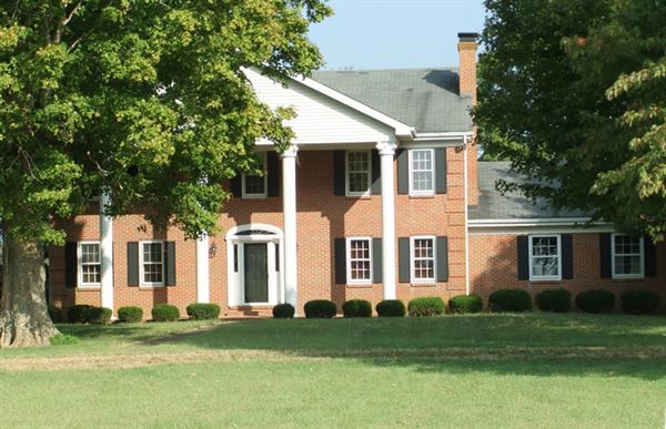 The Tucker Homestead and Log Cabin