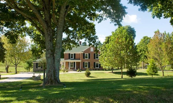 The Tucker Homestead and Log Cabin