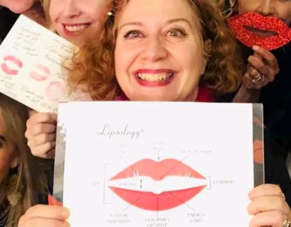 Laura E. West, Fortune-teller & Certified Lipsologist