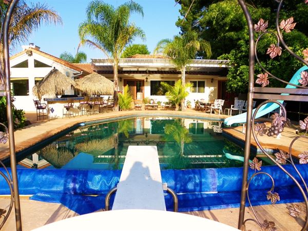 Tropical Tiki Bar & Swirly Pool Slide