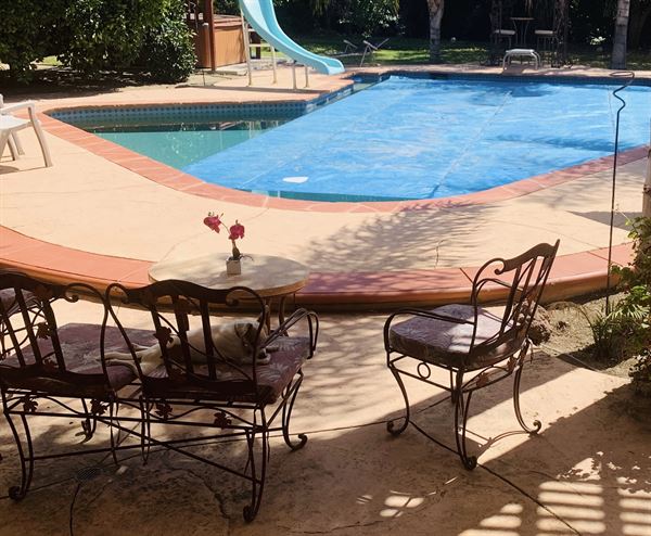 Tropical Tiki Bar & Swirly Pool Slide