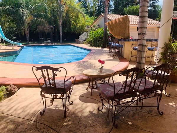 Tropical Tiki Bar & Swirly Pool Slide