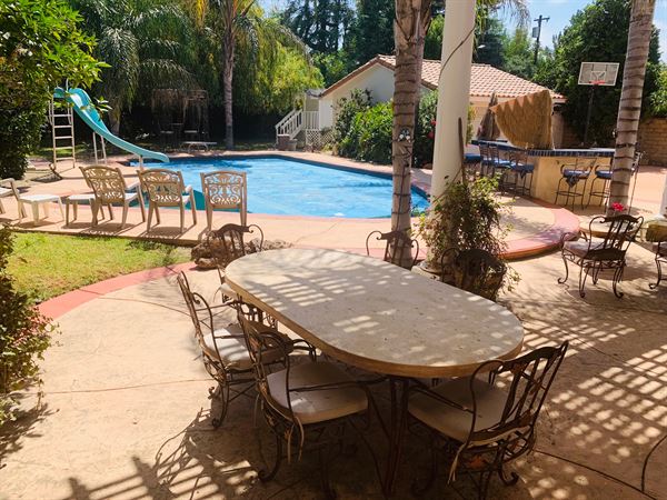 Tropical Tiki Bar & Swirly Pool Slide