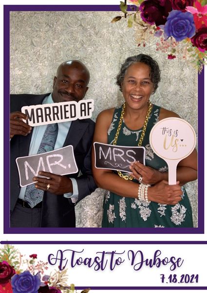 The Phototique Photo Booth and Flower Wall Rental