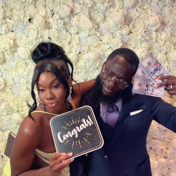 The Phototique Photo Booth and Flower Wall Rental