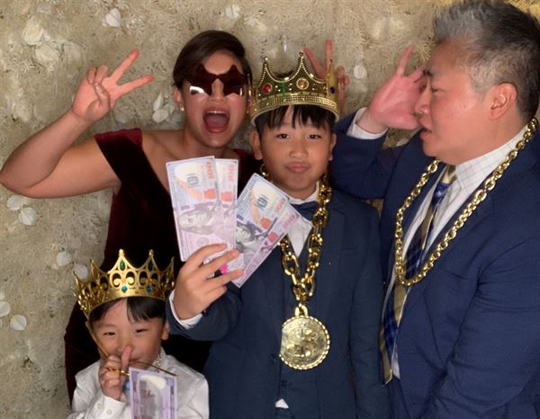 The Phototique Photo Booth and Flower Wall Rental