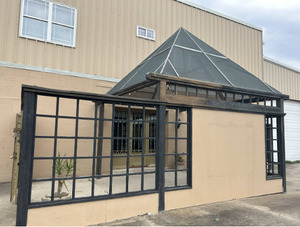 Open-Air Rear Patio (Screened Triangle Top • Seats Up to 40)