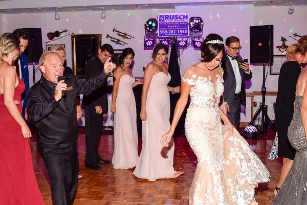 Rusch Entertainment DJs Uplights Bands Dueling Pianos