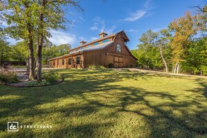 modern cedar barn located on 30 acres